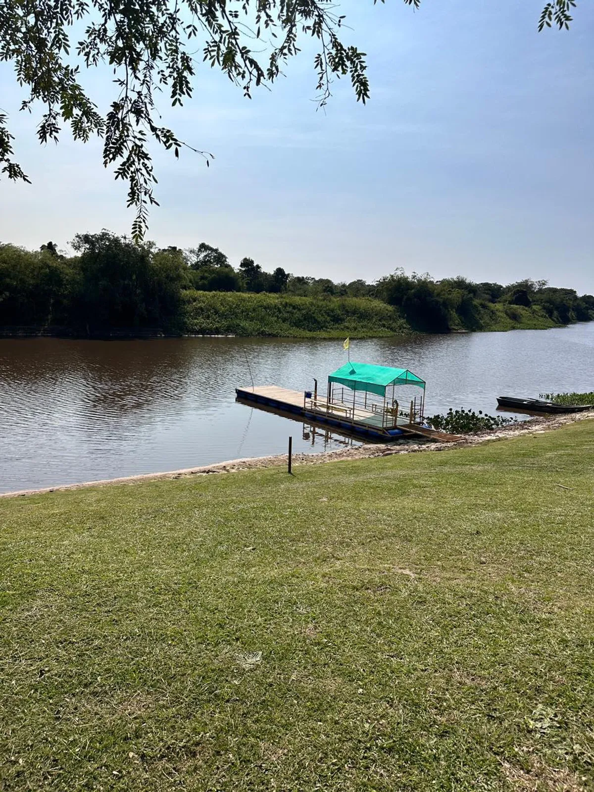 Floating dock on the riverbank